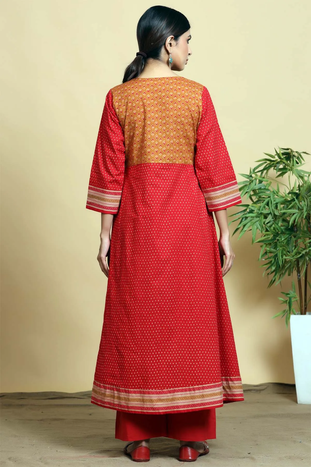Kalidaar kurta in angrakha style in brick red color