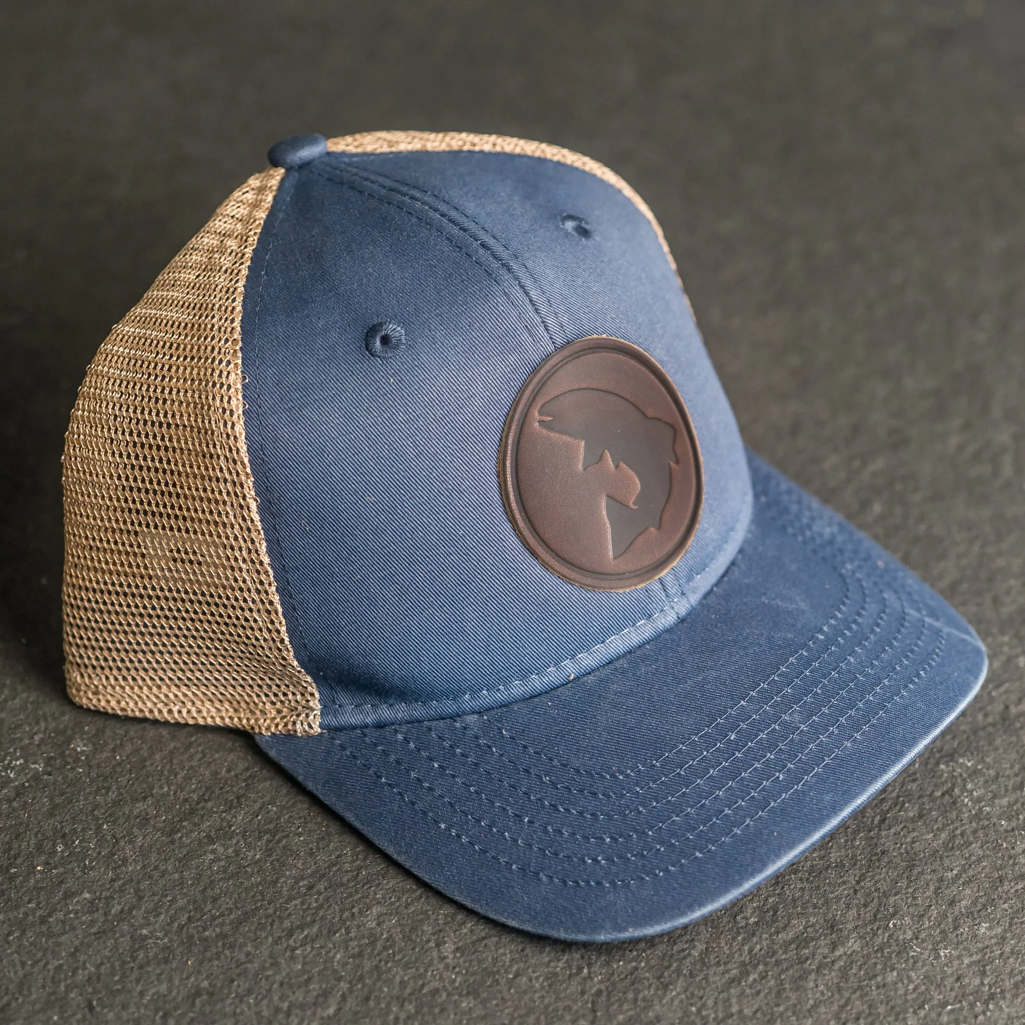 Leather Patch Ponytail Style Hat - Circle Patch - Fish Stamp